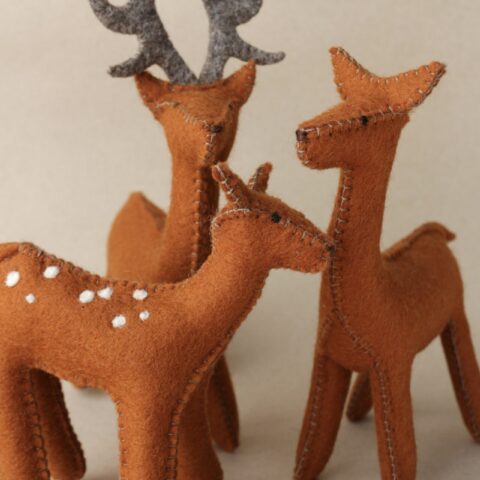 Deer, doe and fawn family in wool felt