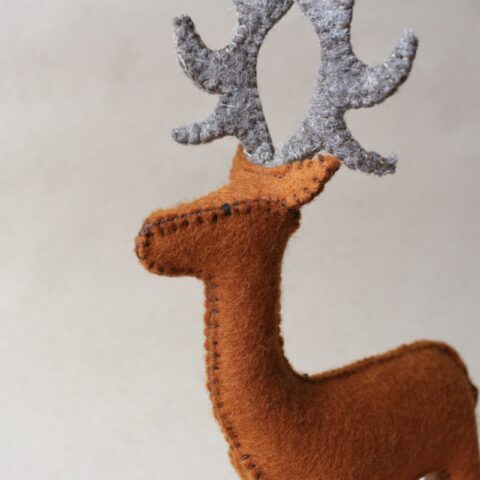 Hand-made deer figurine in wool felt