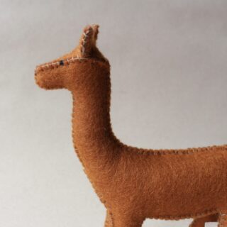 Hand-sewn doe figurine in felted wool